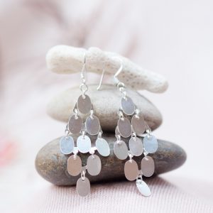 Stylish silver petal earrings in a diamond formation,